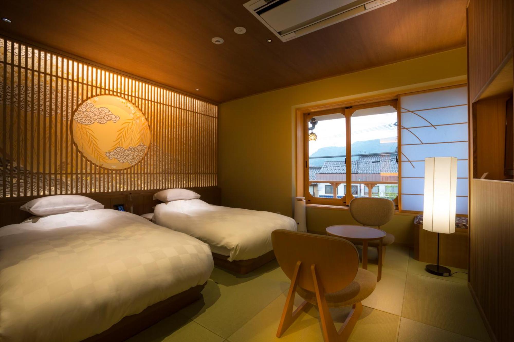 Kinosaki Onsen Tokitotoki Hotel Тойока Стая снимка