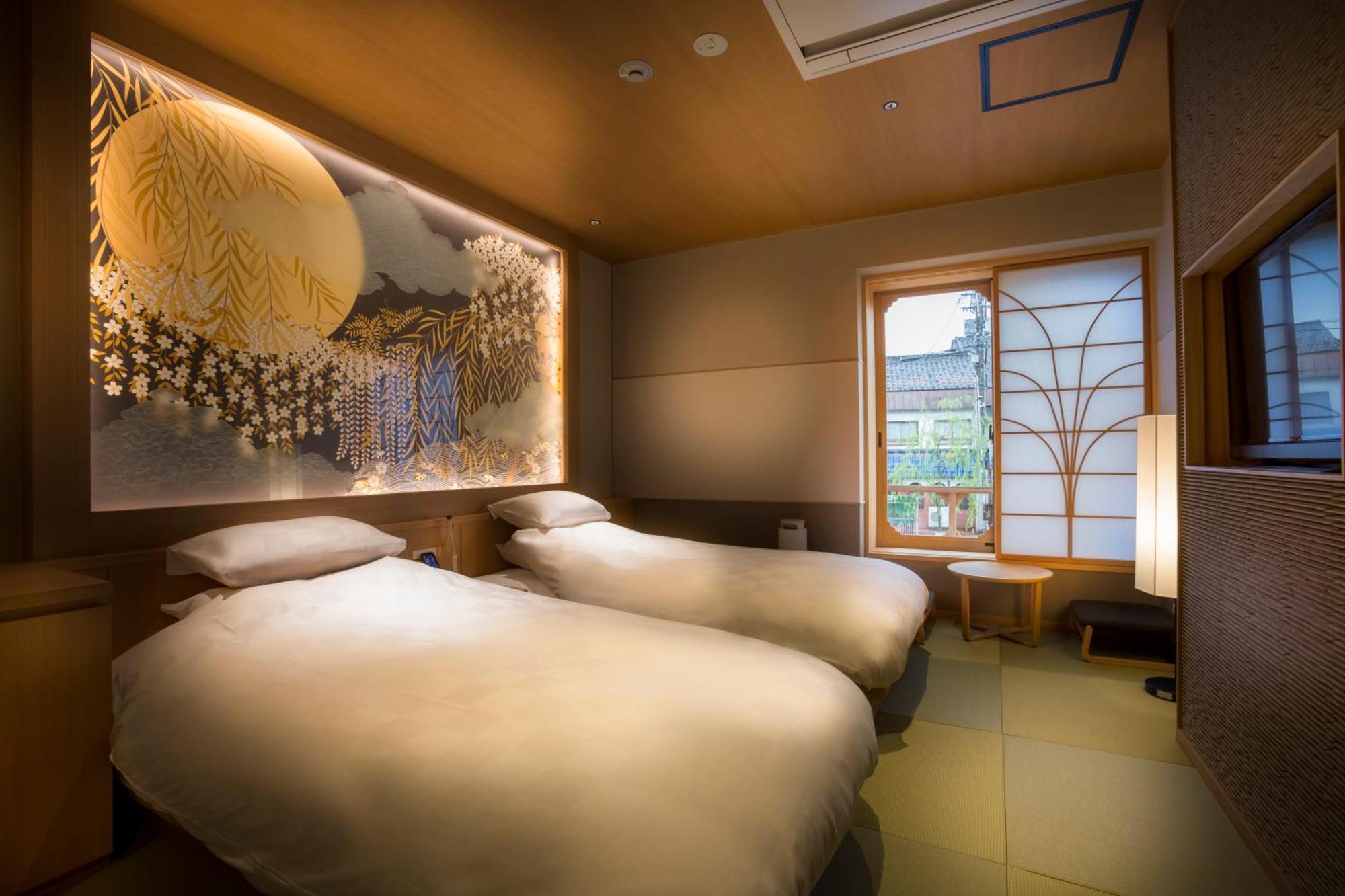 Kinosaki Onsen Tokitotoki Hotel Тойока Стая снимка