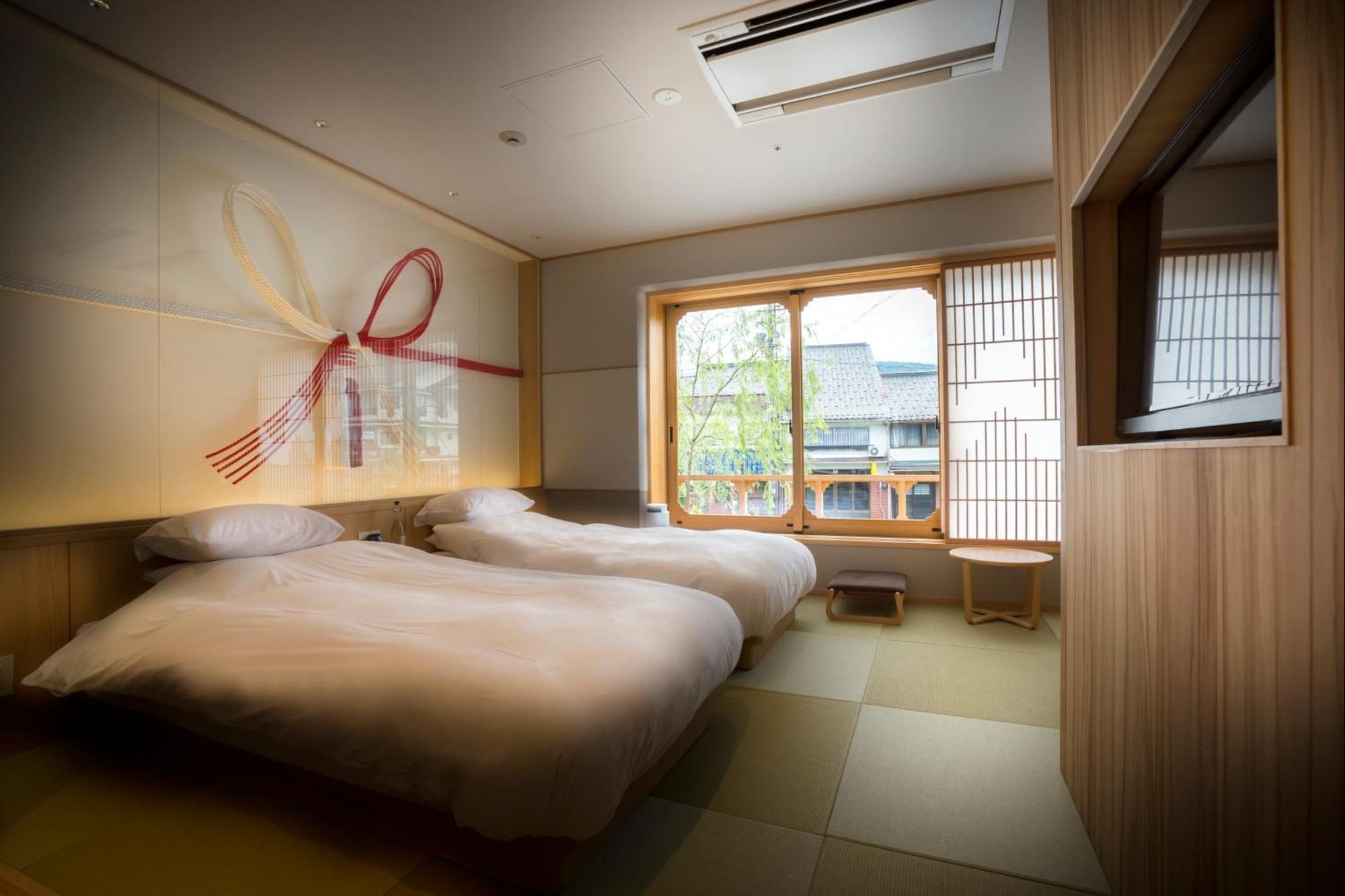 Kinosaki Onsen Tokitotoki Hotel Тойока Екстериор снимка